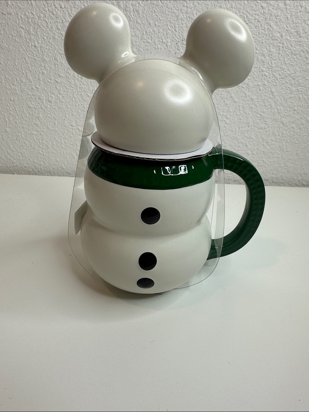 Disney White Snowman Mug with Dark Green Handle